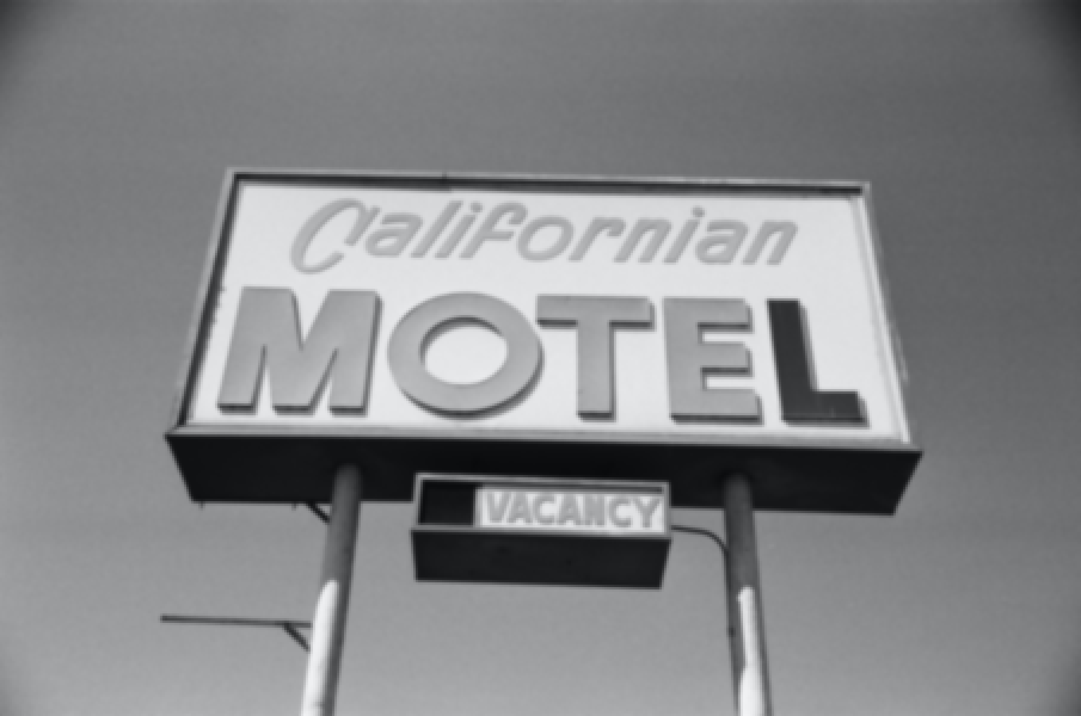 A motel displaying room vacancy sign